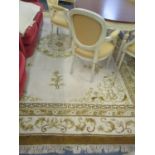 A large Indian cream and mustard coloured rug, 143 x 112