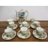 A Phoenix ware, Thomas Forrester & Sons, six setting coffee service depicting oriental scenes (sugar