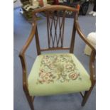 An early 19th century mahogany carver with tapestry seat