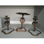 An Indian brass set of snake candlesticks and comport