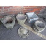 Four mixed garden stoneware planters, together with a wall hanging plaque