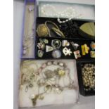 Late 20th century ski-ing badges and mixed costume jewellery to include silver items and a brass