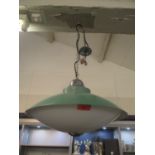 A 1960s modernist flying saucer hanging lamp having an opaline glass shade, re-wired and pat tested