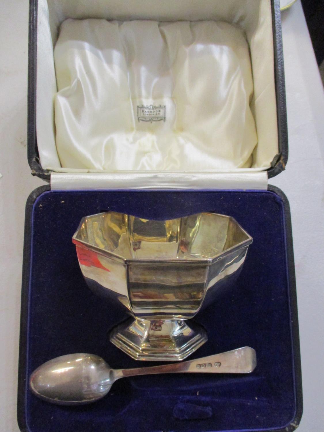 A silver christening set, total weight 130g, by Harrods, in presentation box