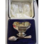 A silver christening set, total weight 130g, by Harrods, in presentation box