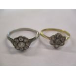 Two gold coloured metal rings, each set with diamonds
