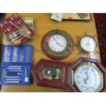 Three modern clocks to include a Regulator and two ship style clocks and a quantity of boxed cutlery