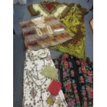 A quantity of 1960s and 1970s clothing to include an Eastern black tunic with needlepoint