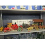 A vintage wooden Noah's Ark with mixed wooden animals and figures, and a vintage wooden train set