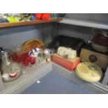 A mixed lot to include a Gladstone bag, bedside clock, radio, glassware and other items