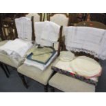 A quantity of vintage linen and lace tableware