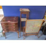 A reproduction mahogany three drawer inset chest, together with a tapestry fronted fire screen and a