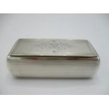 A 19th century white metal snuff box of rectangular form, 2 3/4"l, 1 5/8"w, 1"d, with engine