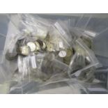 A large lot (approximately 8 kg) of foreign coins from over 60 countries including more unusual