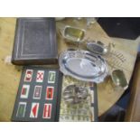 A mixed lot to include cigarette cards, Bible and mixed silver plate