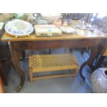 A 19th century walnut table with single frieze drawer on French cabriole legs 30 1/4" x 43 1/4" x 25