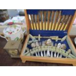 A silver plated canteen of cutlery and flatware, a Worcester Evesham soup tureen and a Kundo brass