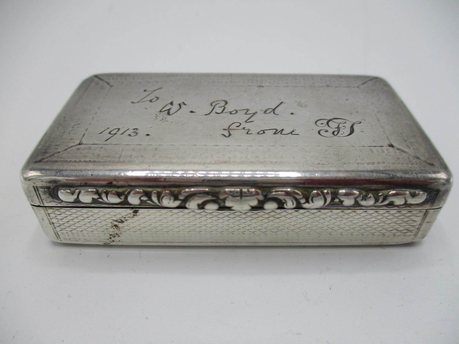 A Victorian silver snuff box, Birmingham 1844, by Edward Smith, having overall engine turned
