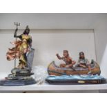 A Juliana Collection handmade resin figural model of Red Indians in a canoe, together with another