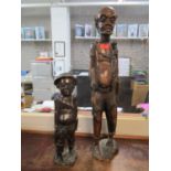Two African carved wooden figures