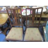A pair of early 20th century mahogany inlaid dining chairs Location: RAF