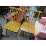 Two mid 20th century Ercol kitchen dining chairs