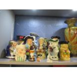 A quantity of character jugs to include a Royal Doulton 'Happy John' Toby jug, Tony Wood jugs and