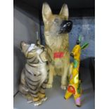 A large Beswick model of an Alsatian dog, a china model of a cat and a giraffe
