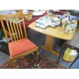 An Ercol blonde elm extending dining table, 29" h x 60"w and a set of six slat back dining chairs