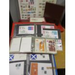 A collection of first day covers, recent issue and postcard stamps