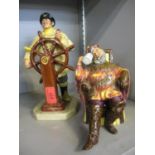 A Royal Doulton 'The Helmsman' figure 1973 HN2499, together with a Royal Doulton 'The Foaming Quart'