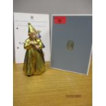 A Royal Copenhagen figure Sandman No 1145 with a gilt coat and branded box