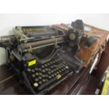 A mixed lot to include an Underwood typewriter, Baby Projector, two early 20th century hand lights