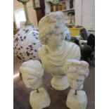 Three plaster busts on stands, of Grecian men and women