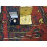 A 9ct gold plated bangle, an 18ct gold cameo, a 9ct gold chain, 4g, a 9ct locket 5.4g and yellow
