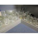 A large quantity of miscellaneous moulded and cut glass to include candlesticks, sundae dishes and