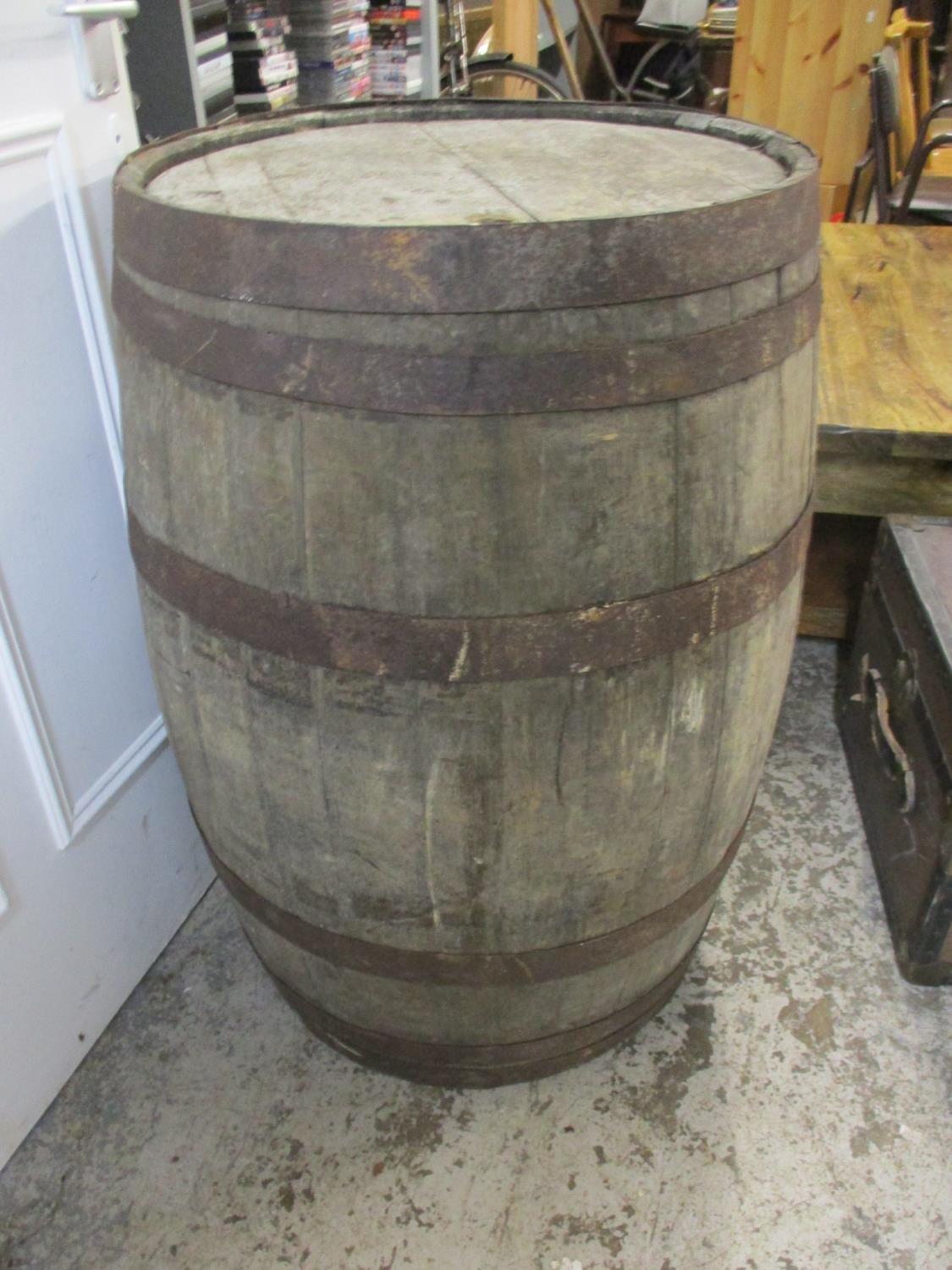 A barrel having wrought iron supports