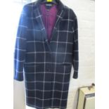 A modern Tommy Hilfiger ladies woollen coat, size small (one button missing)