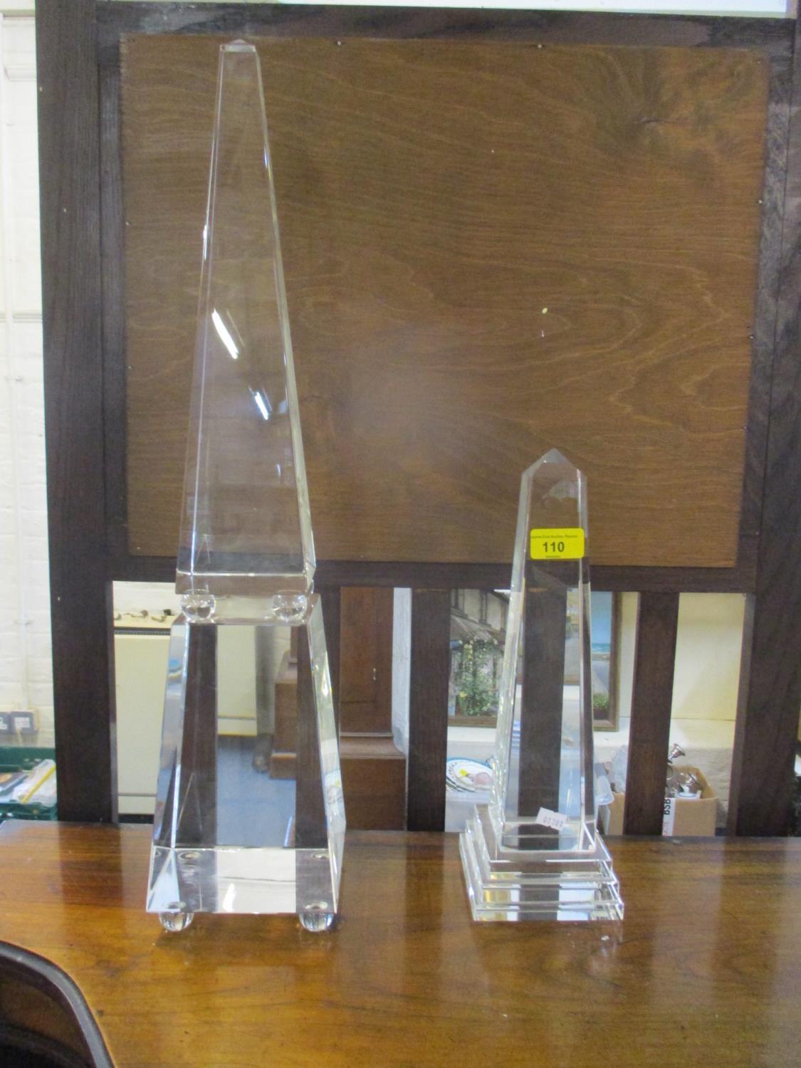 A 20th century cut glass obelisk on stepped cut base 13 1/2"h, and another