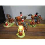 A collection of John Beswick porcelain and Beswick composition Thelwell figurines