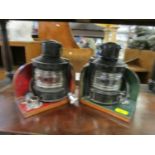 Two port and starboard boat navigate lights, mounted as bookends