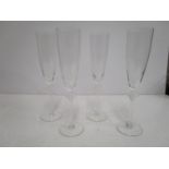 Marc Lalique for Lalique Glass - a set of four Roxanne champagne flutes, the frosted and clear glass