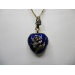 A gold coloured metal and blue enamelled, heart shaped pendant, decorated with a flower, set with