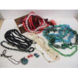 A quantity of turquoise and blue hard stone necklaces and jewellery together with large bead hard