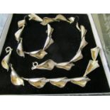 Gertrude Engle for Anton Michelsen - a Rougie silver Calla Lily necklace and bracelet set, marked
