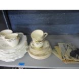 Ceramics to include a Poole Delphis pattern vase, a set of Victorian plates, teacups, saucers and