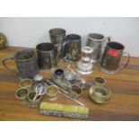 A quantity of silver plate and silver to include five plated tankards and a cased set of silver