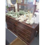 A modern American mahogany finished sideboard having a raised mirror back above nine drawers 34"H