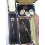 A mixed lot to include a yellow metal stick pin, silver cufflinks and a 15ct gold brooch