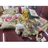 Mixed tapestry cushion covers and textiles, together with modern Steiff soft toys